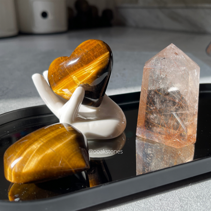 Tiger's Eye heart on ceramic hand stand