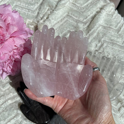 Soft pink rose quartz hand offering bowl