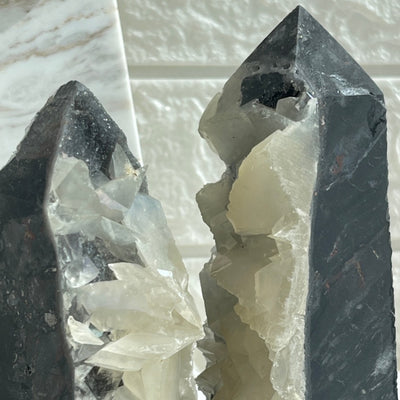 2 calcite tower facing each other