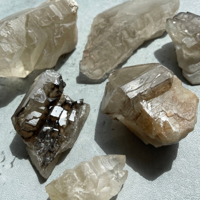 Smoky and citrine celestial quartz placed in a group