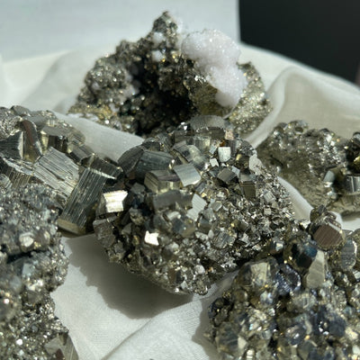 close up on the geometric grow structure of a pyrite cluster